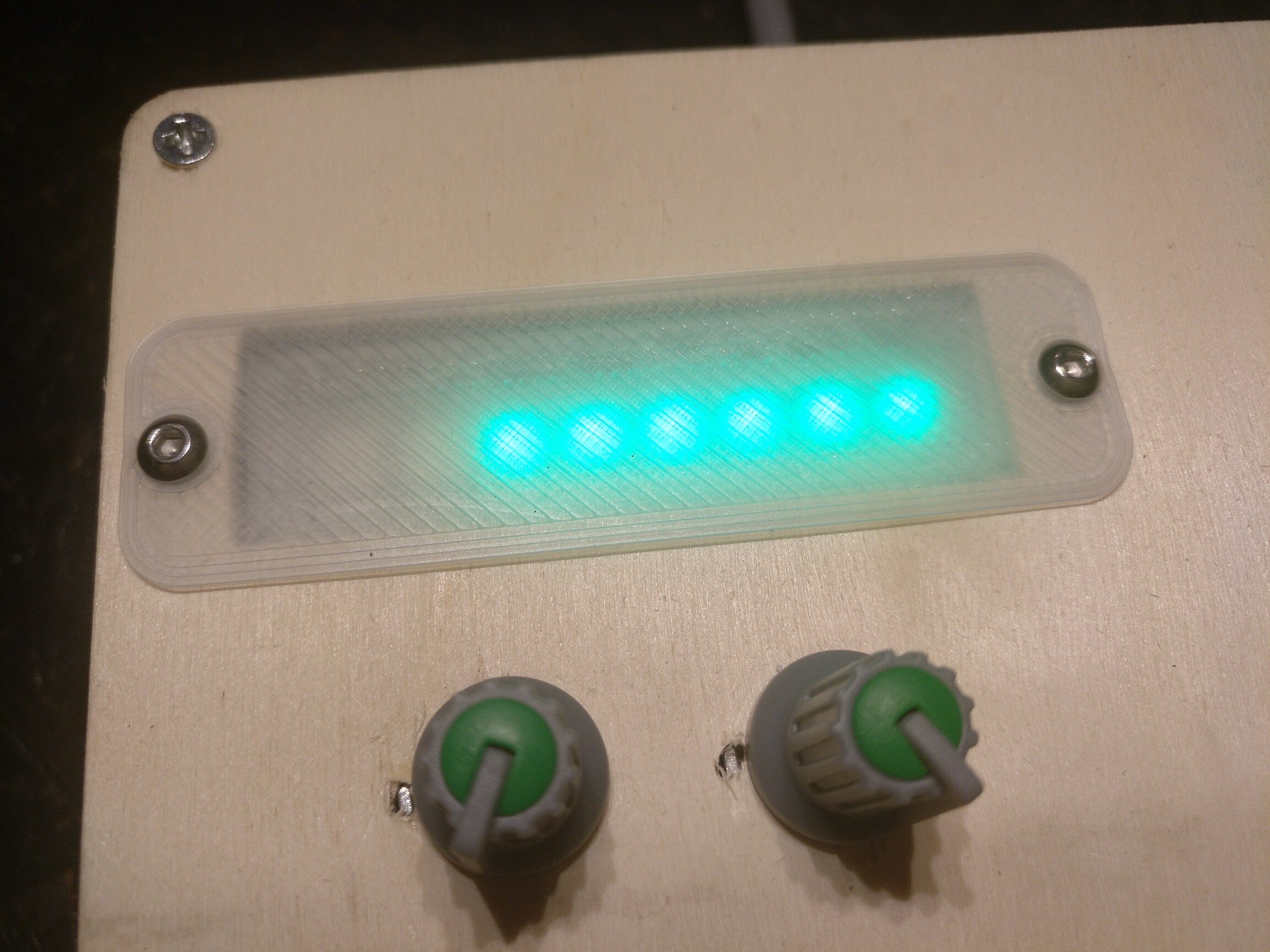 With six LEDs at around 10% intensity of green (it looks better in person)